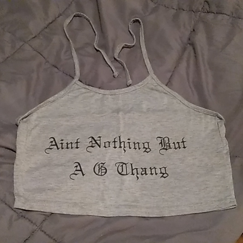 Very cute  Short tank tie back fits small / medium